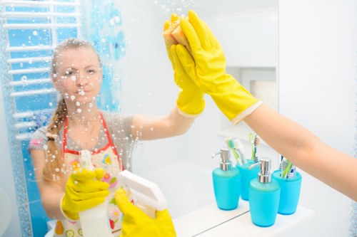 Professional cleaner handling routine upkeep in a Horeditch retail or studio space