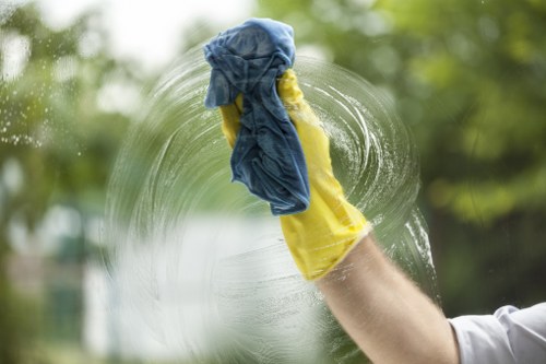 Professional cleaner preparing a spotless home in Horeditch